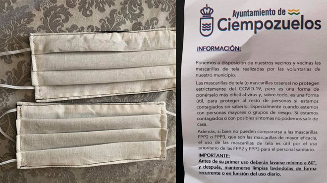 Un vecino recibe sus mascarilla elaboradas por voluntarias locales.