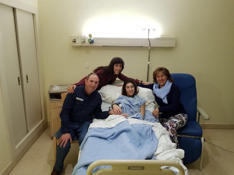 Sandra Aguilar junto a su familia.