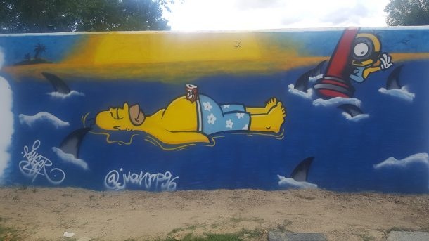 Grafiti de Homer Simpson y un minion